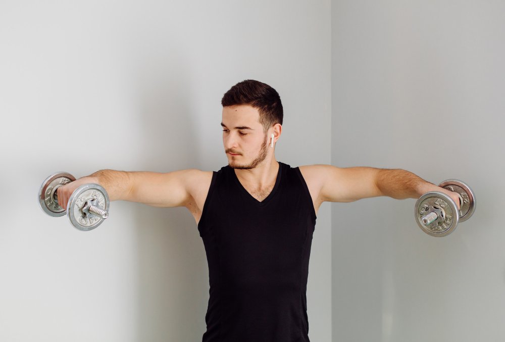 Unleashing the Power of DB Shoulder Fly for Sculpted Shoulders